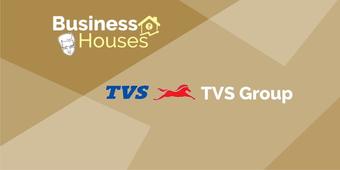 A graphical representation of a business house tvs group with logo in a brown background.