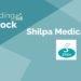 Trending stocks – shilpa medicare ltd. 8 A blue background with a logo for shilpa medicare ltd. , a pharmaceutical company, in the center. The logo is white and blue and consists of the company's name in a stylized font.