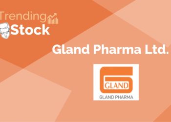 A graphic representation of a trending stock. It has an orange background with darker orange geometric shapes creating a pattern. In the upper left corner, there is an icon of a face, next to which are the words “trending stock” and an upward graph indicating positive performance. The central part of the image prominently displays “gland pharma ltd.