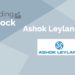 Trending stocks – ashok leyland ltd. 7 A graphic image of a trending stock "ashok leyland ltd. " with a background gradient of grey and black.
