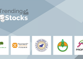 A group of company logos displayed on a gray background with the text "trending stocks" above them. Logos include engg, godrej properties, we make people move, torrent power, and ambika cotton mills ltd.